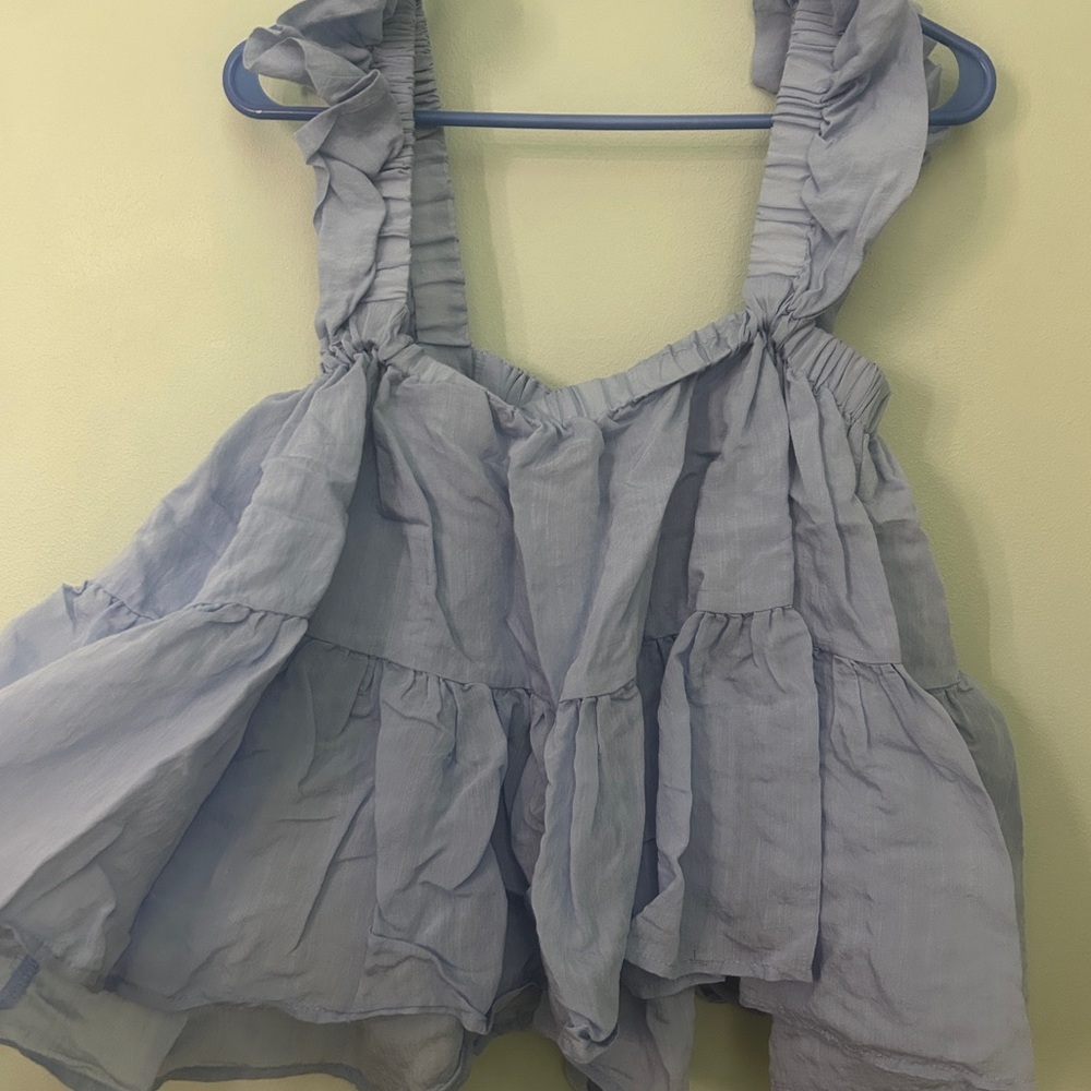 Light blue alter’d state top